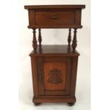 A 20th oak bedside table with single drawer over single cabinet door on bun feet, 83cm high x 40cm