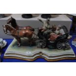 A large Capodimonte group of two horses pulling a carriage with driver and a seated couple, signed B