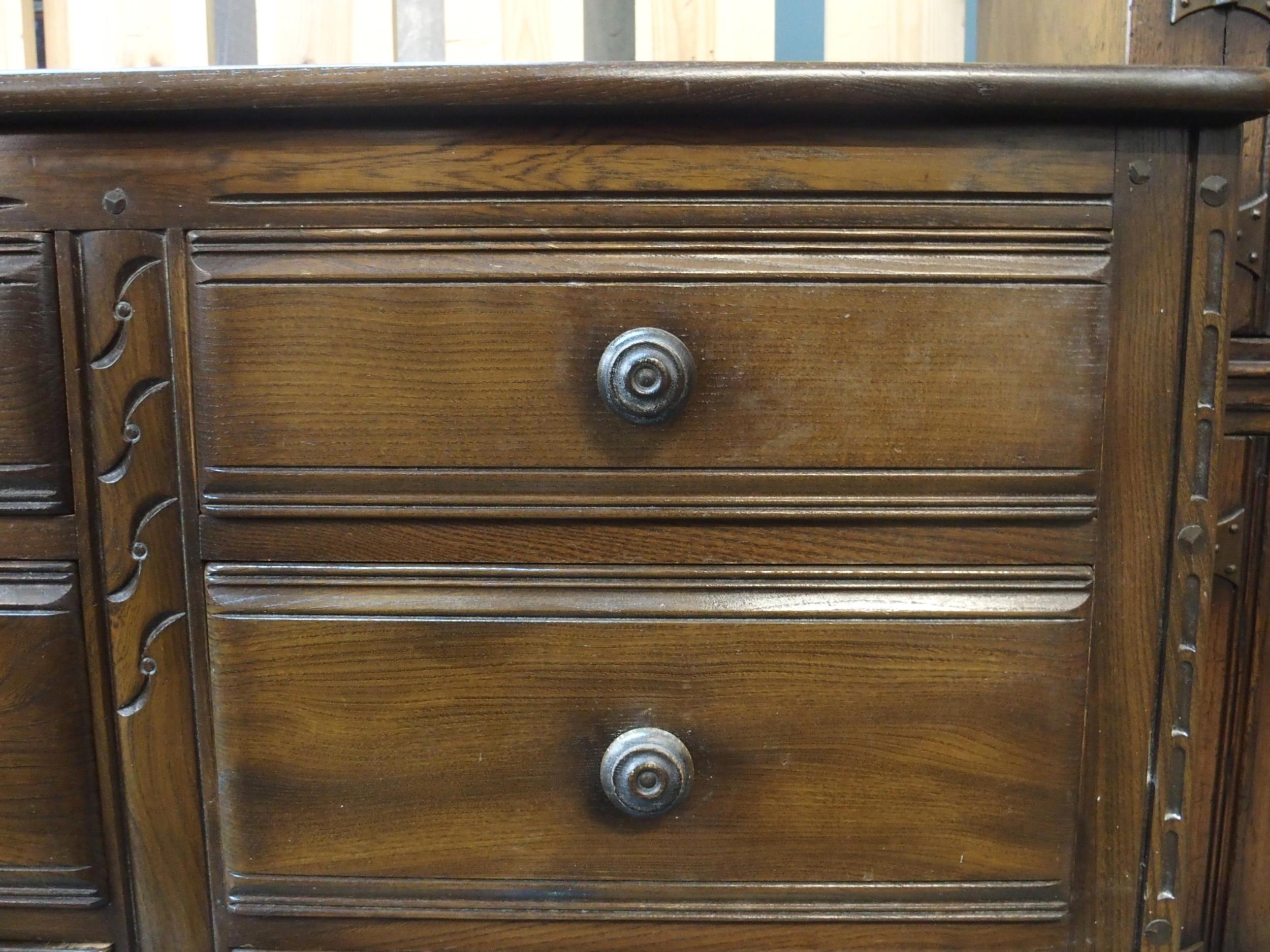 A mid 20th century elm and beech Ercol chest of six drawers, 70cm high x 98cm wide x 49cm deep - Image 2 of 4