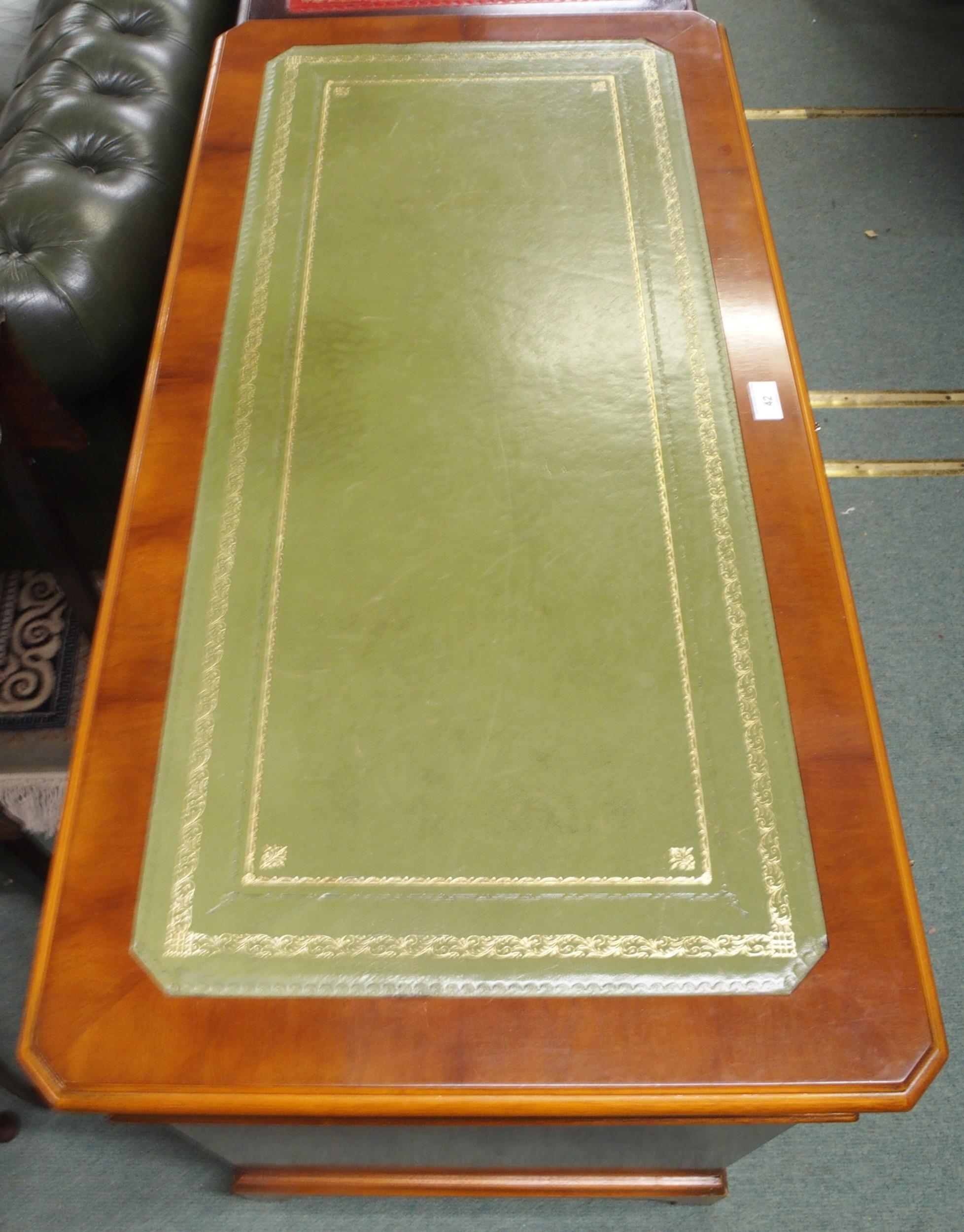 A 20th century mahogany twin pedestal writing desk with green writing skiver over central long - Image 8 of 8