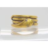 A Victorian rolled gold coiled snake ring, finger size P1/2, weight 6.4gms Condition Report: