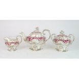 A Rockingham style teaset of mouldedÊrococoÊdesign, the white ground with gilt vine and grape