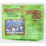 A boxed Subbuteo World Cup Edition table soccer set, with additional boxed components (including a