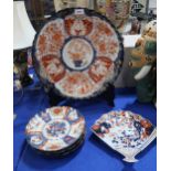 A large imari charger decorated with a central tree in a pot, 40cm diameter, a fan shaped dish,