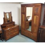A late Victorian mahogany and walnut veneered two piece bedroom suite comprising single mirror
