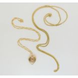 A 14k gold curb link chain, length 68cm, weight 9.8gms, together with a 9ct heart shaped locket