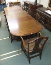 A large 20th century mahogany triple pedestal dining table and eight chairs, table 73cm high x 323cm