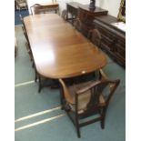 A large 20th century mahogany triple pedestal dining table and eight chairs, table 73cm high x 323cm