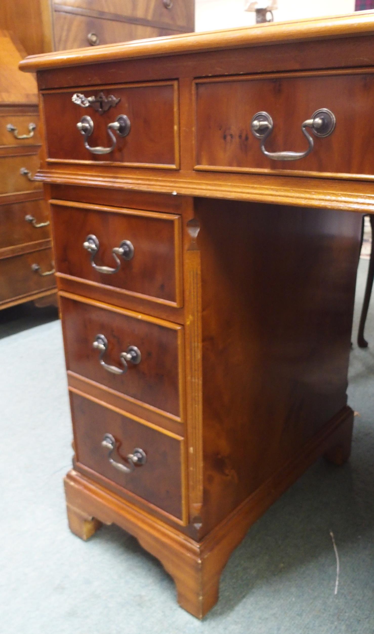 A 20th century mahogany twin pedestal writing desk with green writing skiver over central long - Image 6 of 8