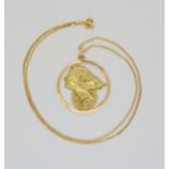 An 18ct gold 'Lady Fortune' pendant and chain, diameter of the pendant 3.5cm, length of the 18ct box