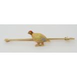 A 15ct bi colour gold and platinum Grouse bird brooch with enamelled detail, length 6.2cm, weight