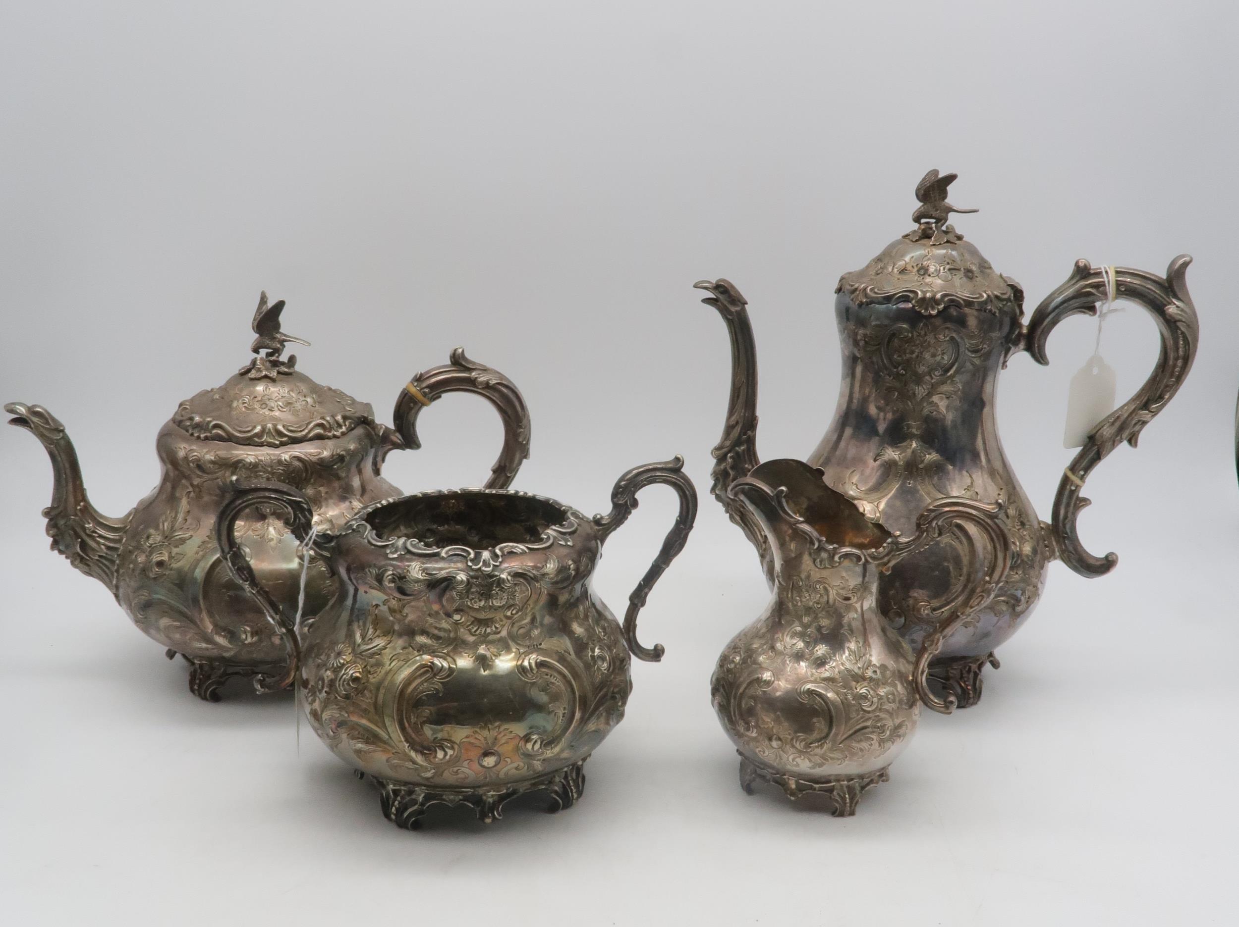 A four piece Victorian EPNS tea service, of baluster form, with embossed scrolling foliate