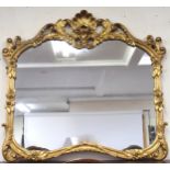 A 20th century Rococo style gilt framed overmantle mirror, 100cm high x 110cm wide Condition