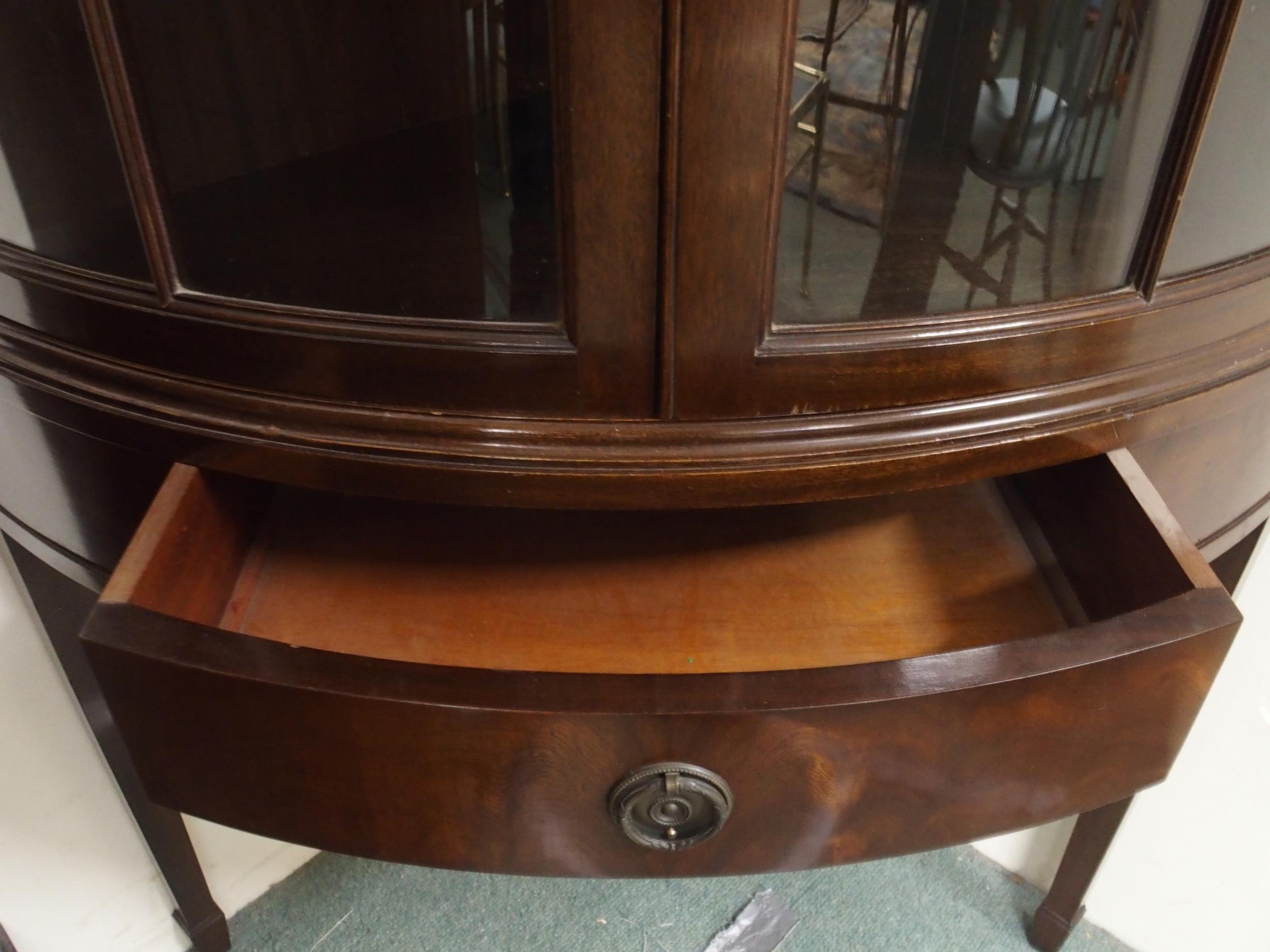 A 20th century mahogany bow front glazed corner cabinet with pair of glazed doors over single drawer - Image 2 of 4