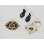 A collection of mourning jewellery to include a pair of jet earrings, a yellow metal mounted agate