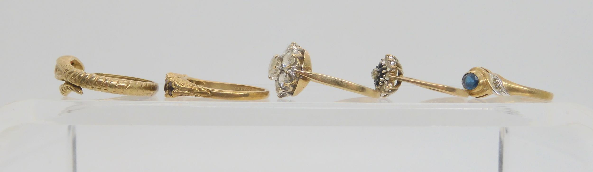 five 9ct gold gem set rings, to include a snake ring with garnet eyes, size P1/2, a five stone - Image 2 of 4