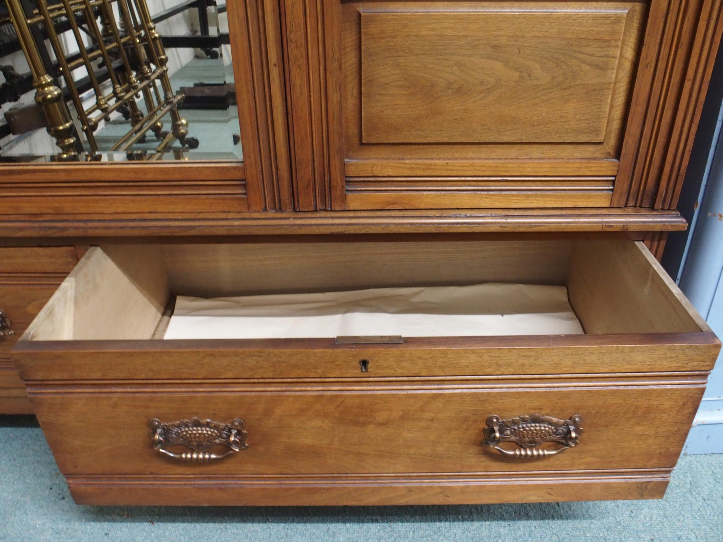 A Victorian mahogany wardrobe with central mirror flanked by doors over two drawers, 201cm high x - Image 6 of 7