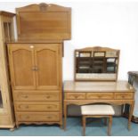 A 20th century light oak bedroom suite comprising armoire, 148cm high x 83cm wide x 45cm deep,