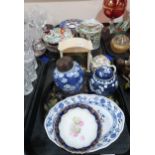 A Meissen blue and white dish, Chinese prunus decorated ginger jars, Canton bowl and teapot, Imari