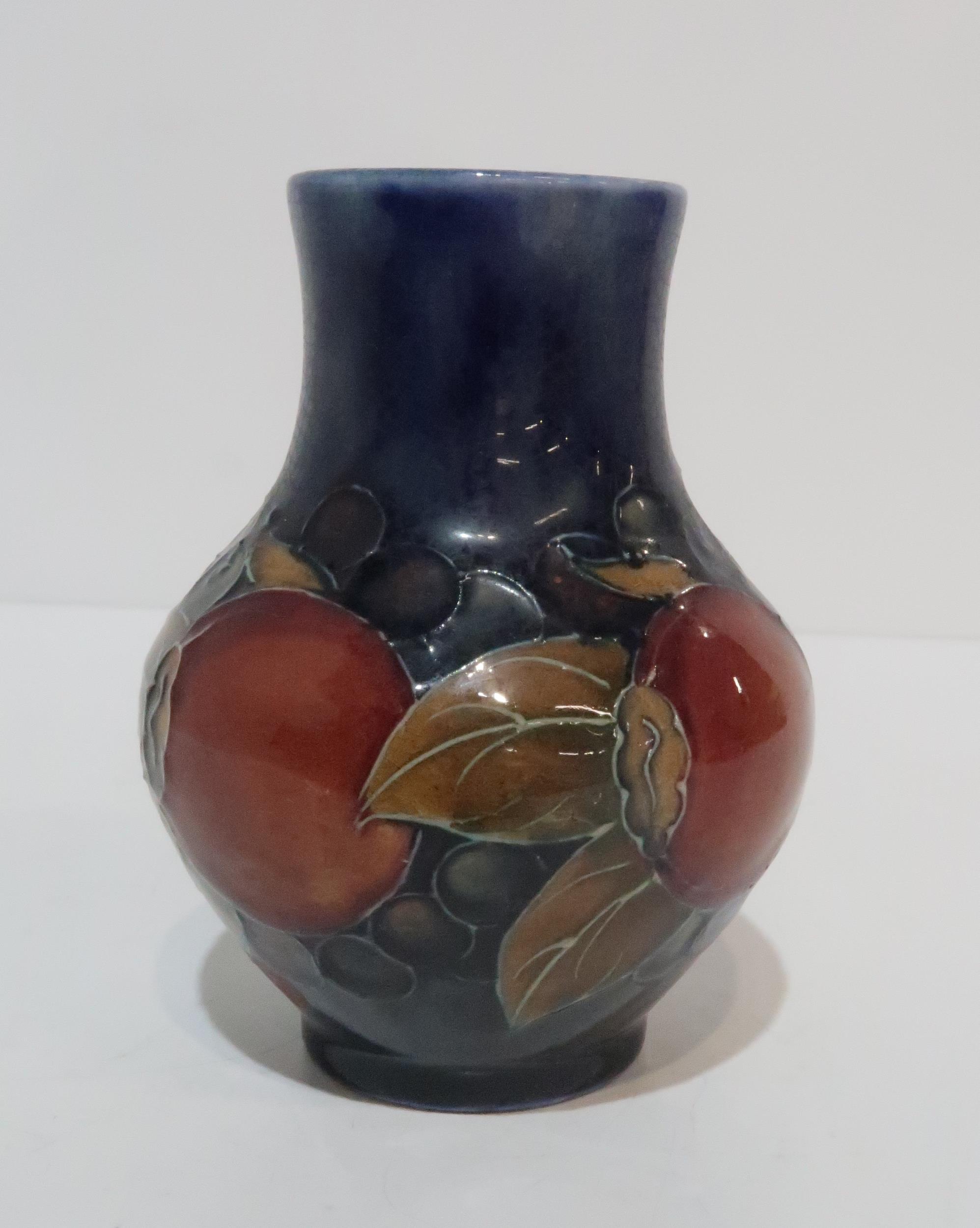 A Moorcroft Pomegranate vase, 10cm high Condition Report:Available upon request - Image 3 of 3