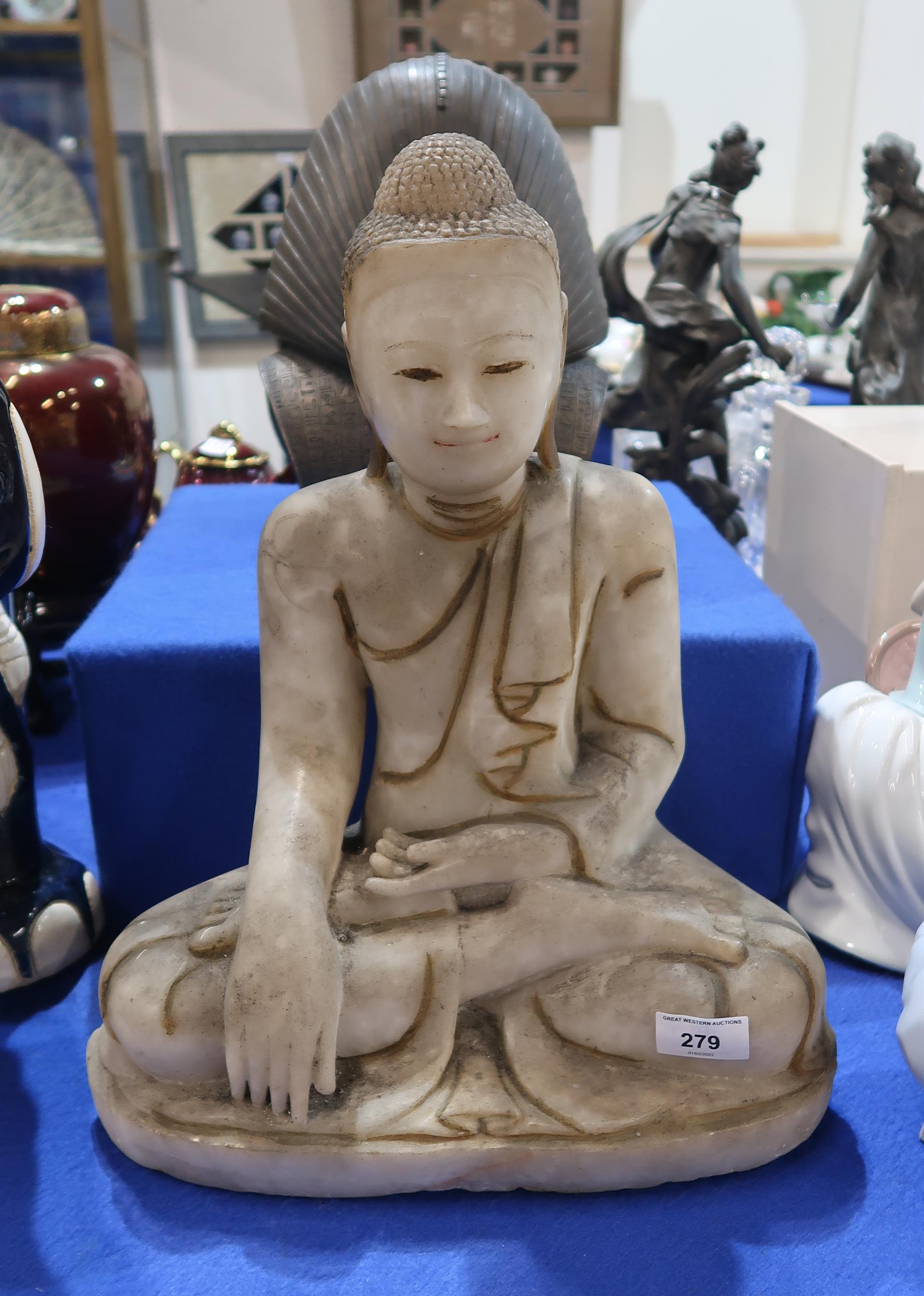 An alabaster figure of Buddha, 43cm high Condition Report:Available upon request