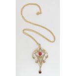 A 9ct gold Garnet, pearl and red gem set Edwardian pendant and chain, both pendant and chain stamped