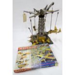 A large Meccano fairground aeroplane construction, fitted with electric motor, together with a boxed
