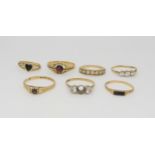 Seven 9ct gold rings, various gem stones to include garnet, some (af) weight all together 10.6gms