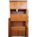 A 20th century teak McIntosh secretaire bookcase with pair of cabinet doors over fall front