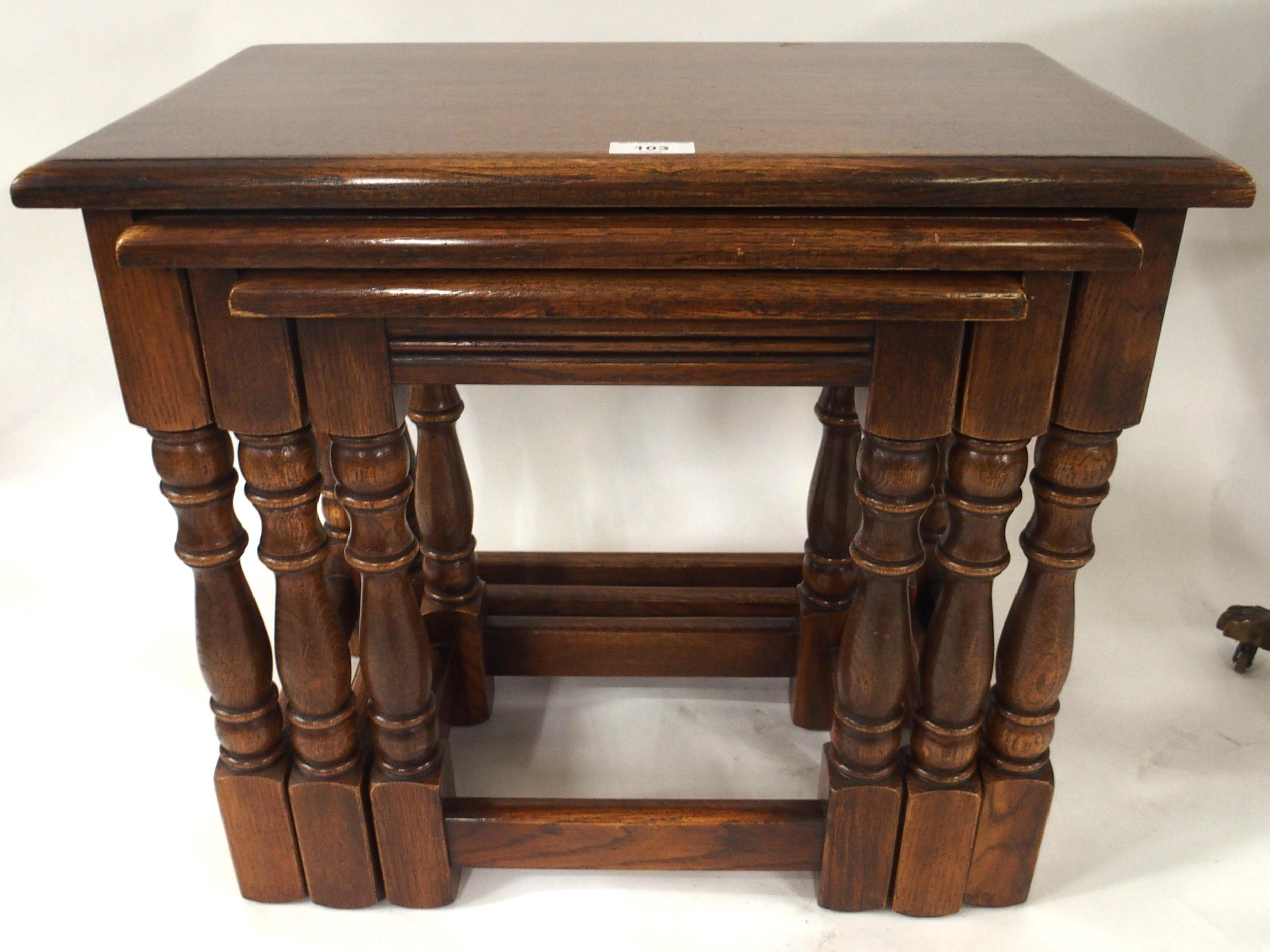 A 20th century mahogany open bookcase, oak nest of three tables and tilt top circular occasional - Image 5 of 6