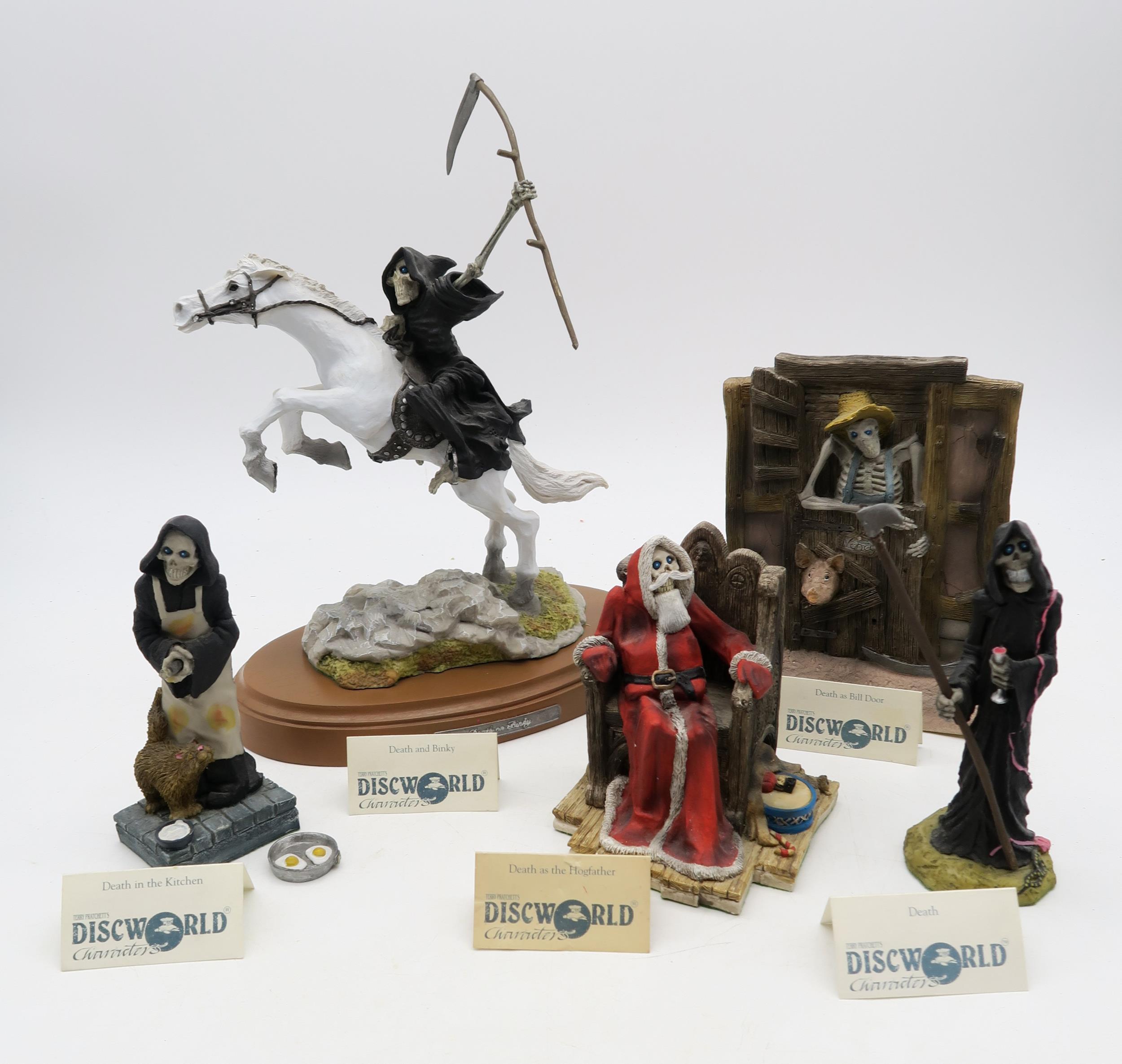 A collection of Terry Pratchett Discworld figures by Clarecraft, comprising Death, Death as the