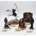 A collection of Terry Pratchett Discworld figures by Clarecraft, comprising Death, Death as the