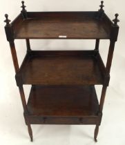 A Victorian mahogany three tier what-not with three open galleried shelves over single drawer with