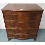 A 20th century mahogany veneered serpentine front four drawer chest on bracket feet, 76cm high x