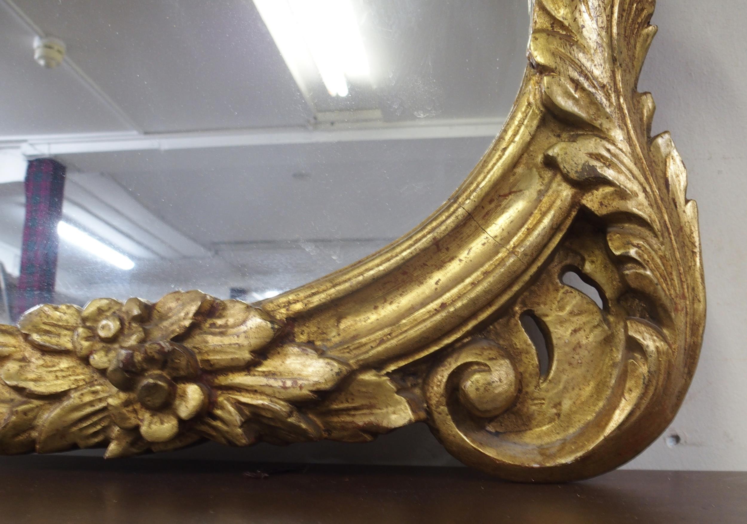 A 20th century Rococo style gilt framed overmantle mirror, 100cm high x 110cm wide Condition - Image 4 of 5