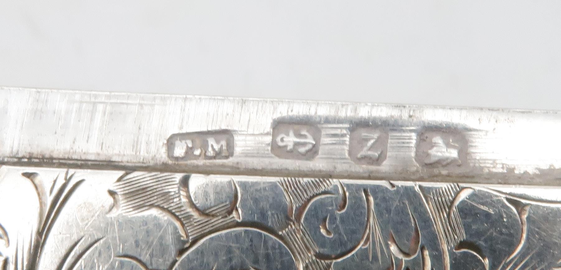 A late Victorian silver card case, the body engraved with scrolling foliate decoration surrounding a - Image 3 of 3