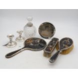 A three piece silver tortoiseshell dressing table set, by W.G.S & Co, Birmingham 1919, a silver