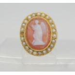 An agate angel cameo ring, mounted in yellow metal, and further set with pearls. Dimension of the