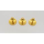A boxed set of 3 18ct gold shirt studs, weight of the studs 5.6gms Condition Report:Available upon