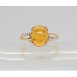 A 9ct GemsTv ring set with a mandarin garnet and white zircon, size O, weight 2.7gms, with a