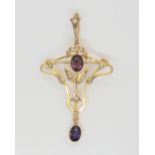 A 9ct gold Edwardian amethyst and pearl pendant, stamped 9ct to the reverse , length 5cm, weight 2.