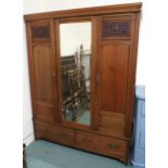 A Victorian mahogany wardrobe with central mirror flanked by doors over two drawers, 201cm high x