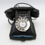 A Bakelite rotary dial telephone Condition Report:Available upon request
