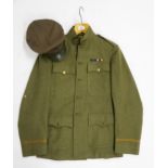 A WW1-era American olive drab military tunic by Heidelberg Wolff & Co., 644 B'way, New York City,