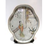 A Chinese dish, painted with a figure and calligraphy Condition Report:Available upon request