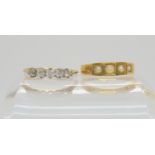 An 18ct gold pearl set ring, hallmarked Birmingham 1900, size R1/2, and a five stone diamond ring,