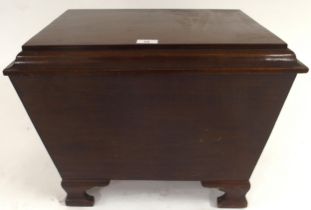 A 20th century mahogany sarcophagus form coal bin with pair of lion masque handles on bracket