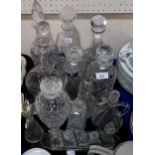 Assorted crystal and glass decanters including a mallet shaped example. Condition Report:No