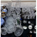 A quantity of cut glass and crystal including Tudor drinking glasses, assorted vases, baskets, other