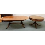 A 20th century mahogany drum table with leather skiver top over four drawers on quadrupedal base,